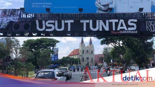 Spanduk ‘Usut Tuntas 1-10-2022’ Bertaburan di Jalan Jalan Kota Malang