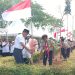 Dr. Ambo Sakka, Pimpin Pemasangan 5000 Bendahara Merah Putih Serentak di Tanah Bumbu