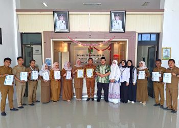 Dinas Nakertrans Tanah Bumbu Peroleh Sertifikasi SNI ISO 9001:2015 dan 27001:2013