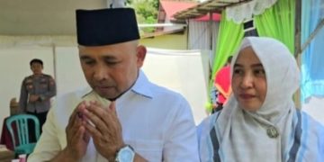 Didampingi Istri Bahsanuddin, Coblos di TPS 06, Kelurahan Batulicin