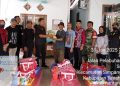 Penyerahan Bantuan kepada Korban Kebakaran di Desa Sejahtera