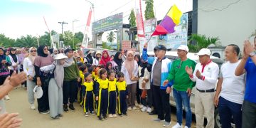 Jalan Sehat Meriahkan Aksi Sinergitas Merah Putih di Kecamatan Mantewe