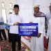 Bupati Tanah Bumbu Andi Rudi Latif Salurkan Bantuan Sosial dan Serukan Gerakan Indonesia ASRI