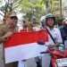 Bersama Wakil, Wali Kota Banjarmasin Bagikan Ribuan Bendera Merah Putih